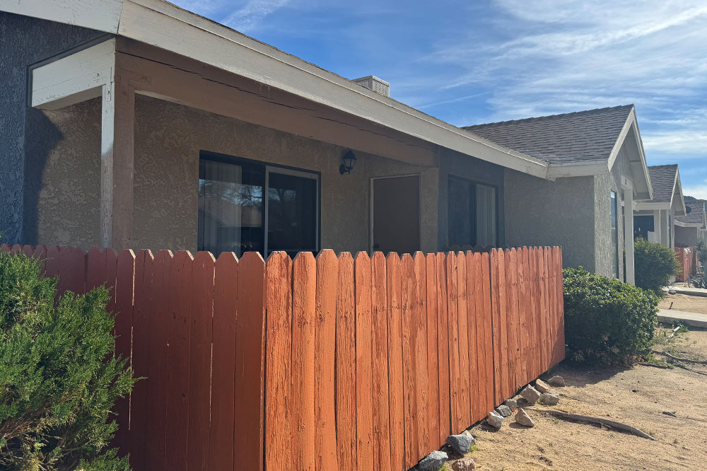 This image displays exterior photo of Quail Springs Village Apartments